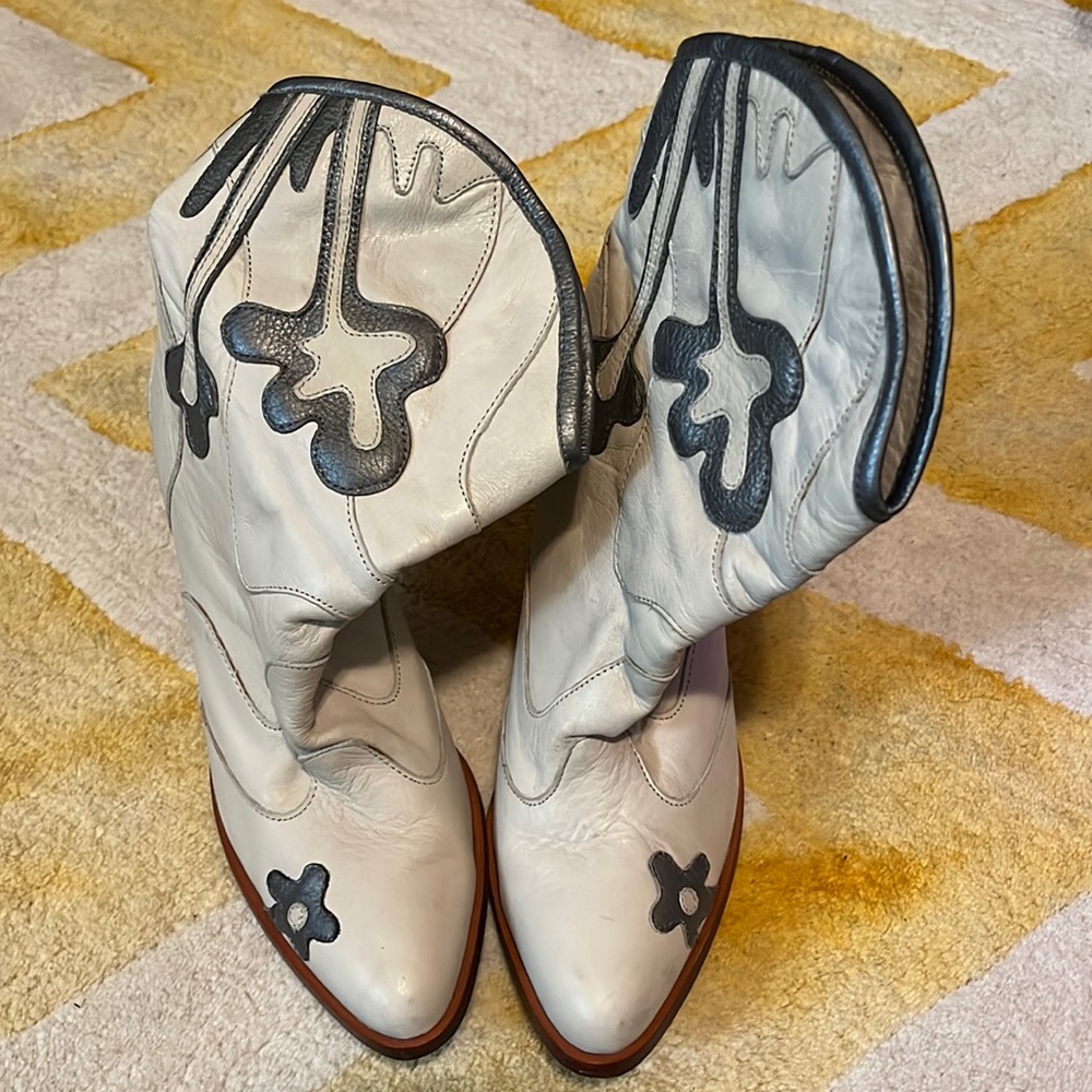 Leather western influenced high heel boots.